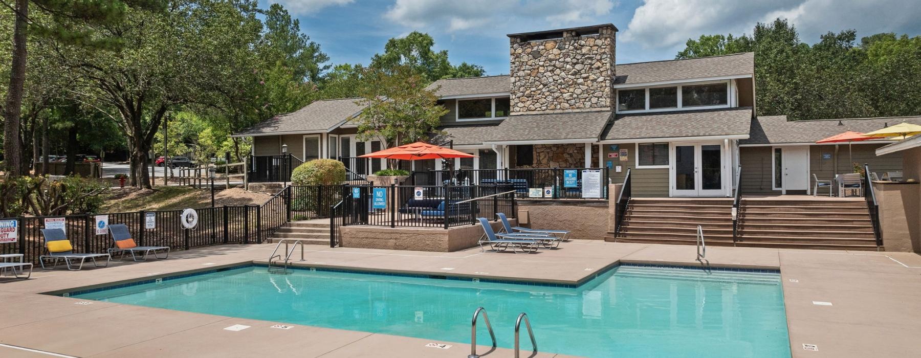 a swimming pool in front of a building